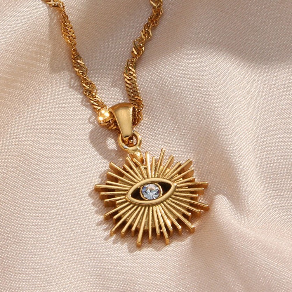 European Popular Devil's Eye Pendant: Stainless Steel Ripple Chain Hollow Radiant Inlaid Diamond Eye Pendant Necklace