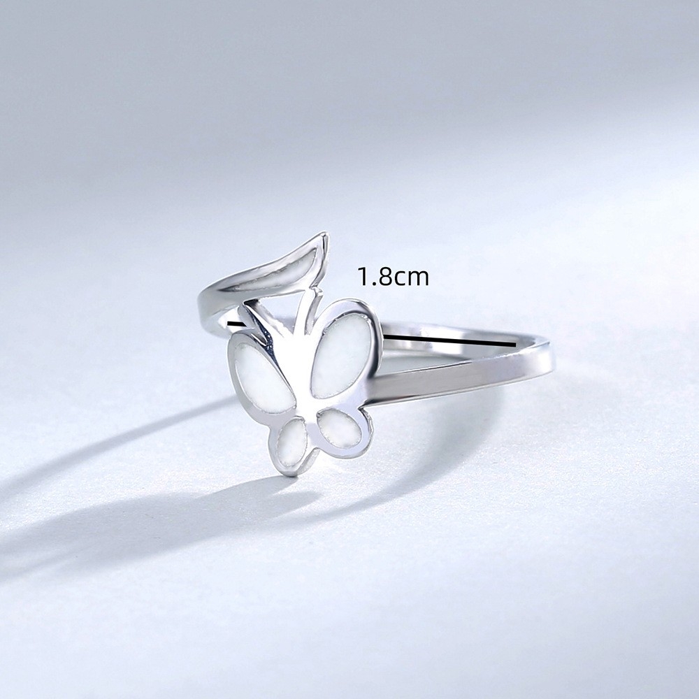 European and American Cross-Border Fashion Jewelry: Butterfly Interlocking Design, Glow-in-the-Dark Oil Drop Stainless Steel Ring, High-Quality Versatile Accessory for Women