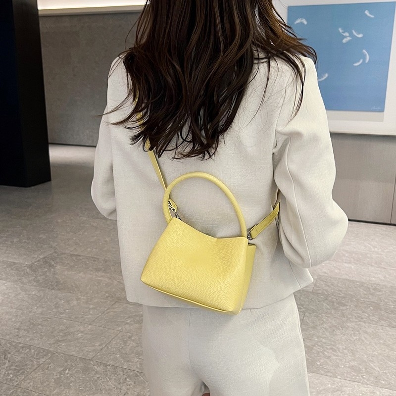 Streamlined Solid Color Mini Bucket Bag, 2023: Soft-Sided Purse, Tailored for Single Shoulder Carry