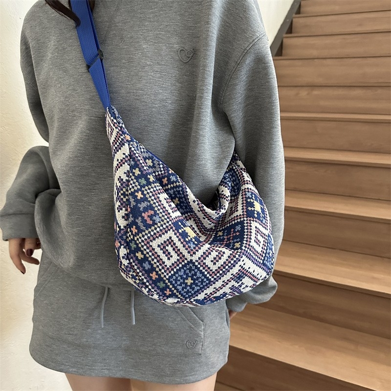 Textured Wool Crossbody Hobo, 2024: Bohemian-Inspired "Dumpling" Silhouette With Global Sensibility